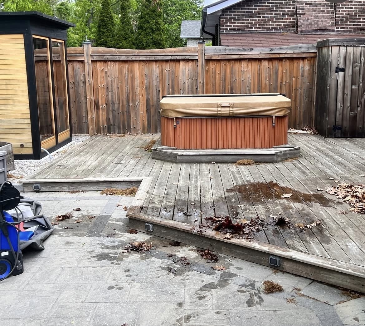 Greyed, weathered deck and fence before staining