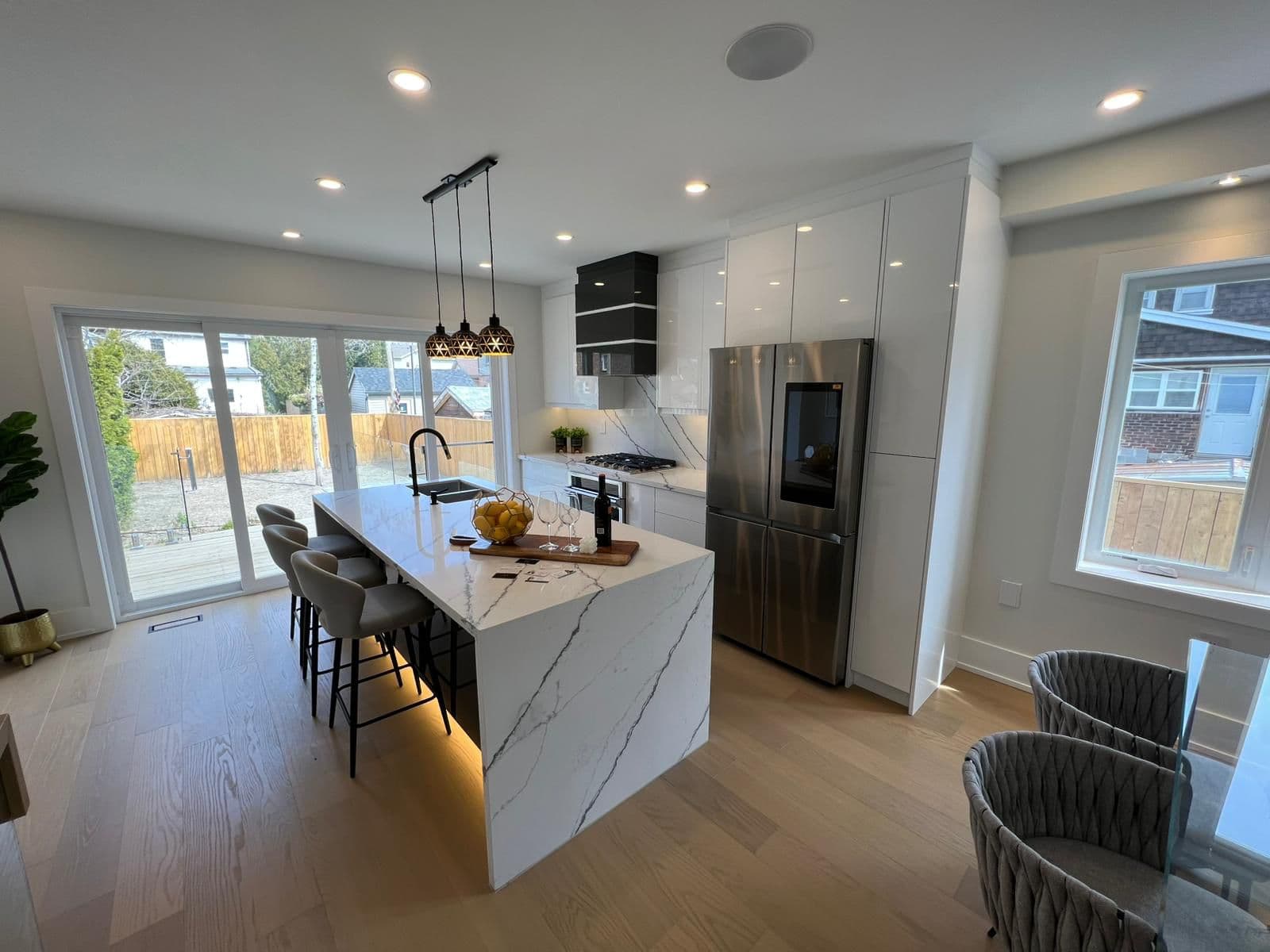 Marble waterfall island kitchen
